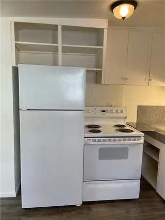 a view of a kitchen with a window