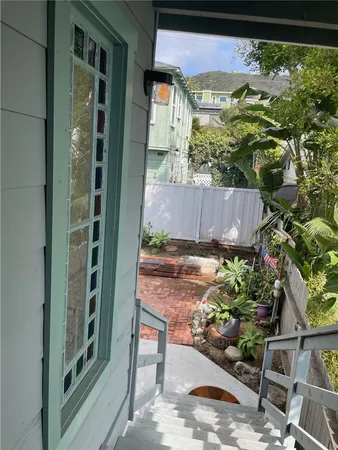 a view of gallery with wooden floor