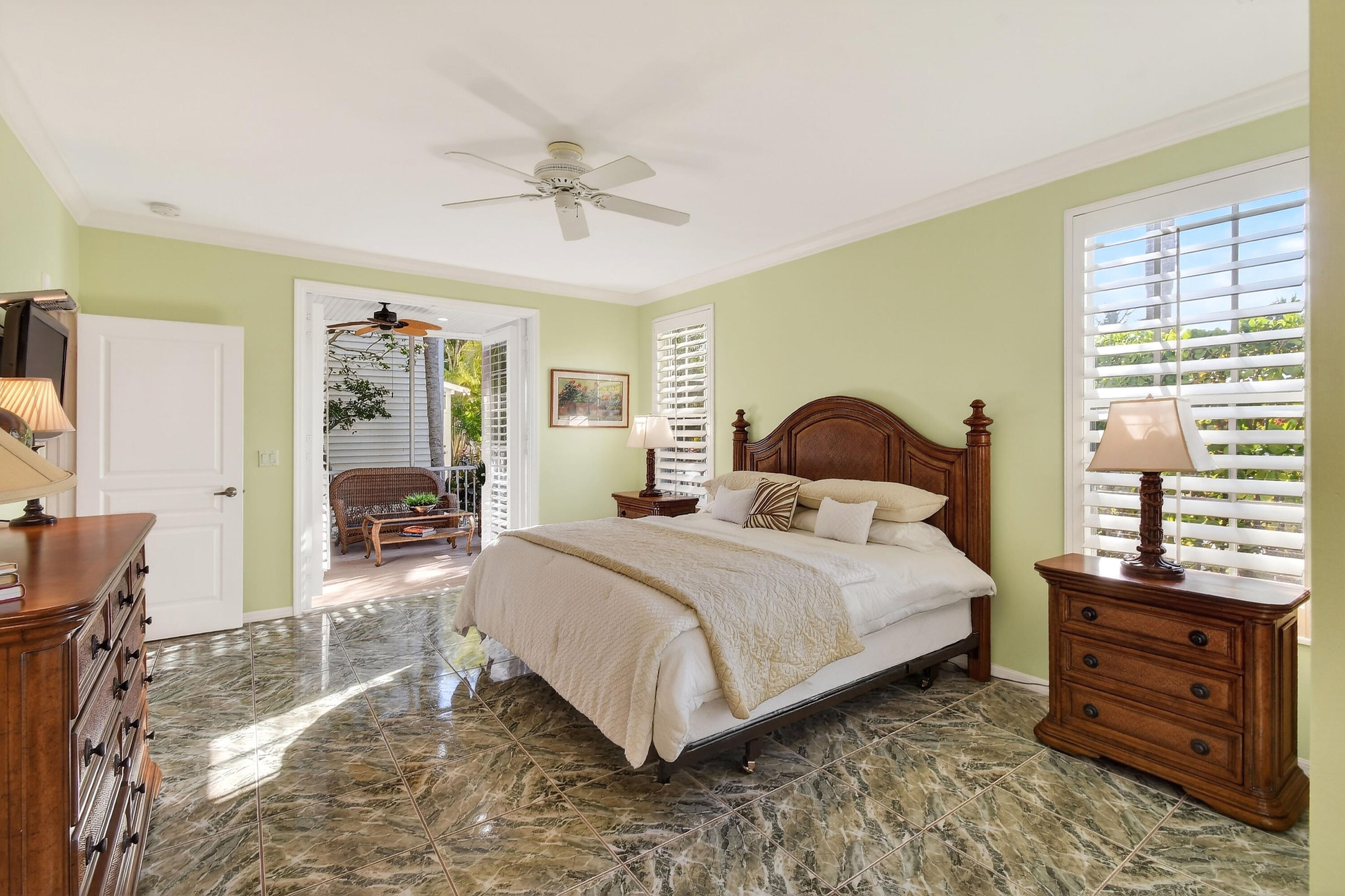 154 Jupiter Key Road Jupiter, FL 33477 - Photo 15 of 64 a bedroom with a bed and a window