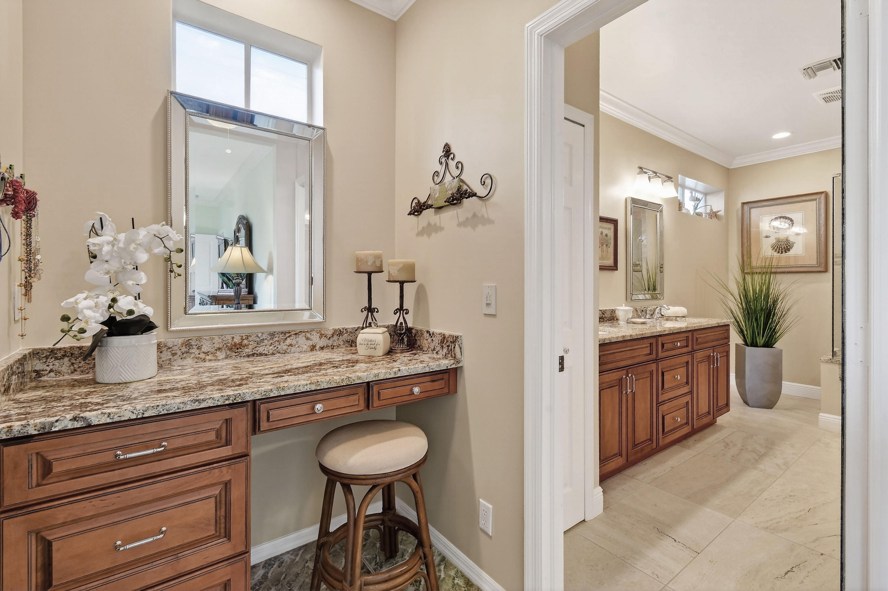154 Jupiter Key Road Jupiter, FL 33477 - Photo 17 of 64 a bathroom with a granite countertop sink a toilet and mirror