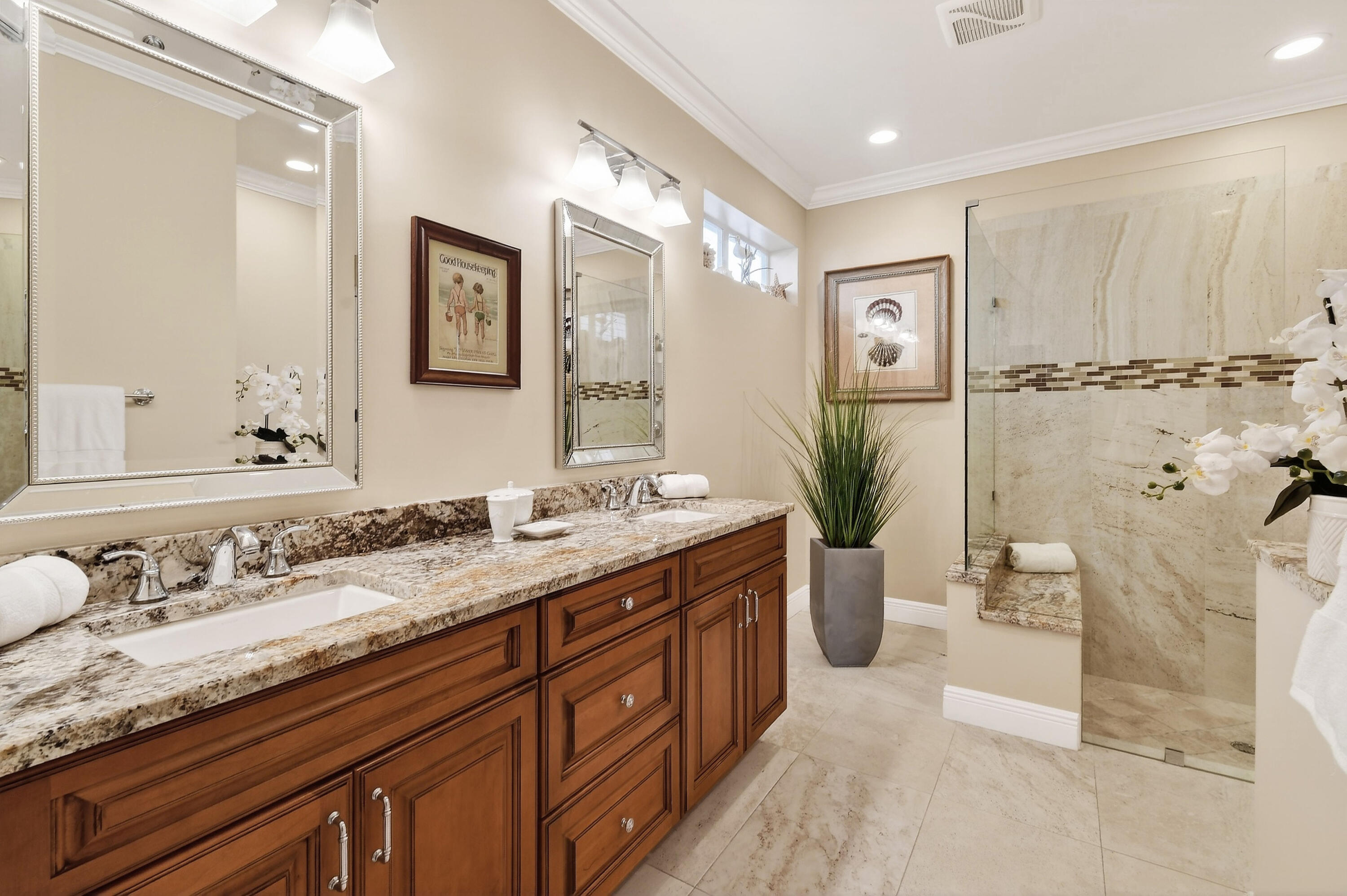 154 Jupiter Key Road Jupiter, FL 33477 - Photo 18 of 64 a spacious bathroom with a granite countertop double vanity sink a mirror and a