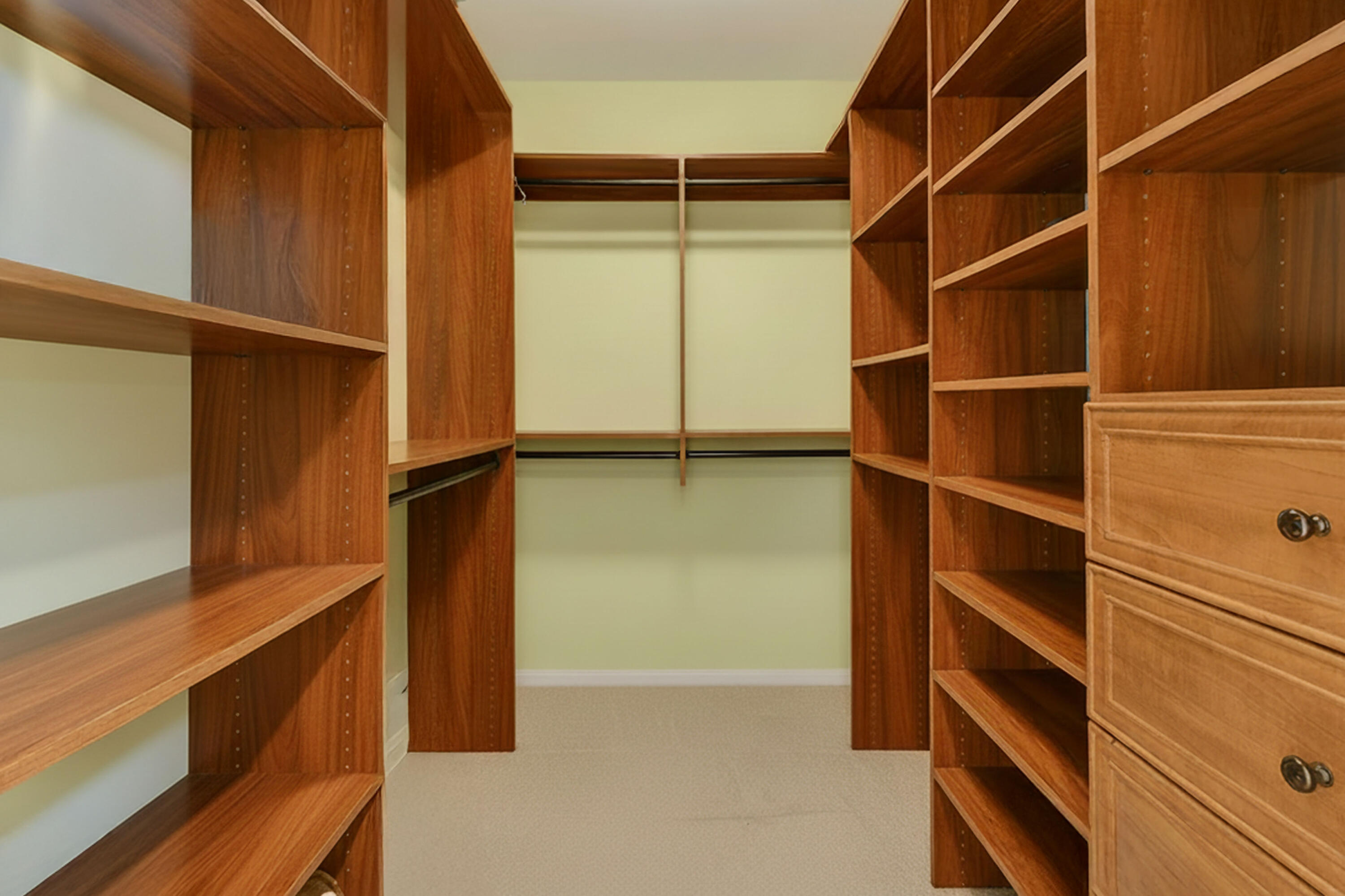 154 Jupiter Key Road Jupiter, FL 33477 - Photo 20 of 64 a view of walk in closet with empty racks