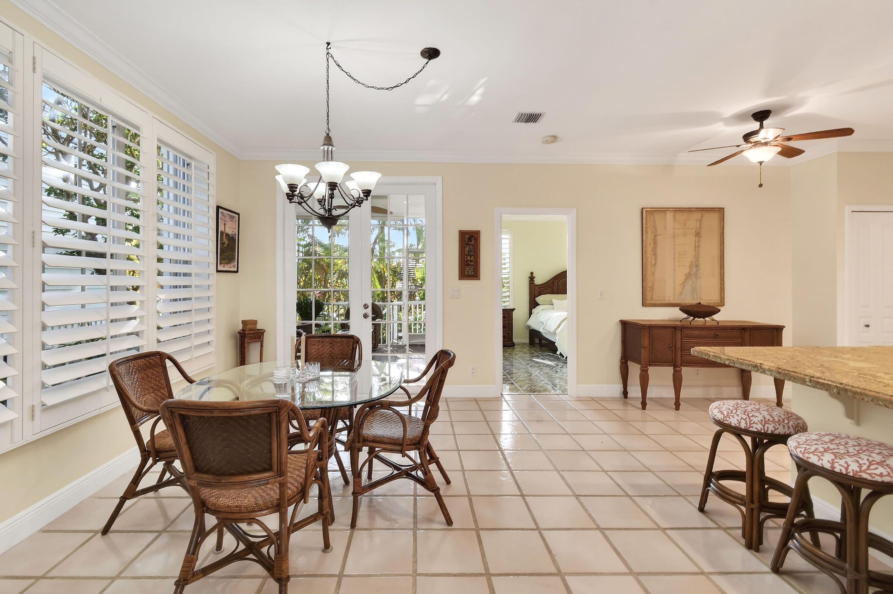 154 Jupiter Key Road Jupiter, FL 33477 - Photo 7 of 64 a view of a dining room with furniture and chandelier