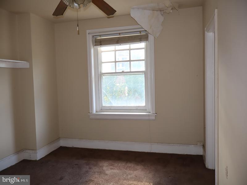 6386 Sherwood Road Philadelphia, PA 19151 - Photo 11 of 18 an empty room with a window