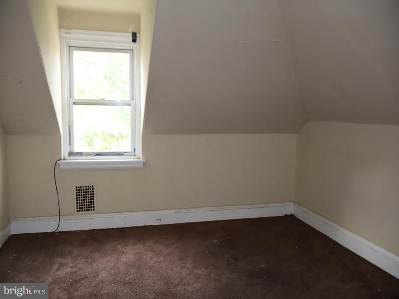 6386 Sherwood Road Philadelphia, PA 19151 - Photo 13 of 18 an empty room with a window