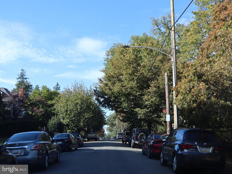 6386 Sherwood Road Philadelphia, PA 19151 - Photo 5 of 18 a view of street with parked cars