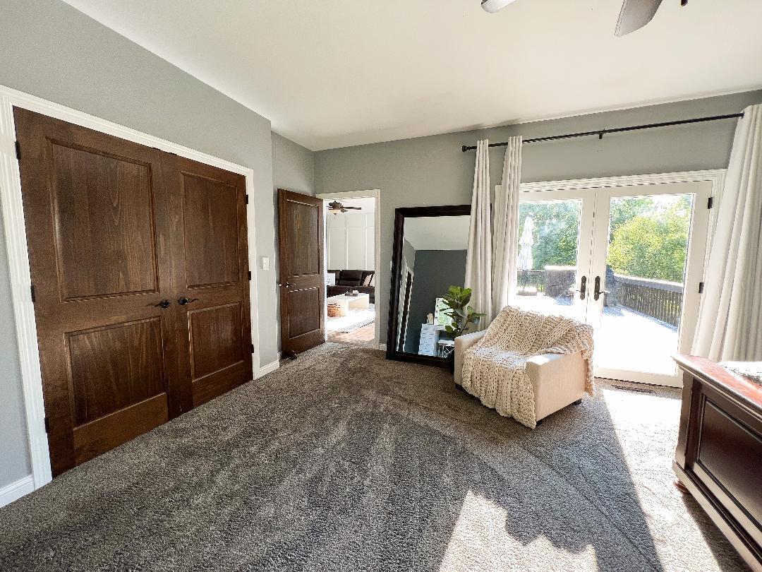 3503 Deep Cut Road Woodstock, IL 60098 - Photo 20 of 34 a living room with furniture and a large window