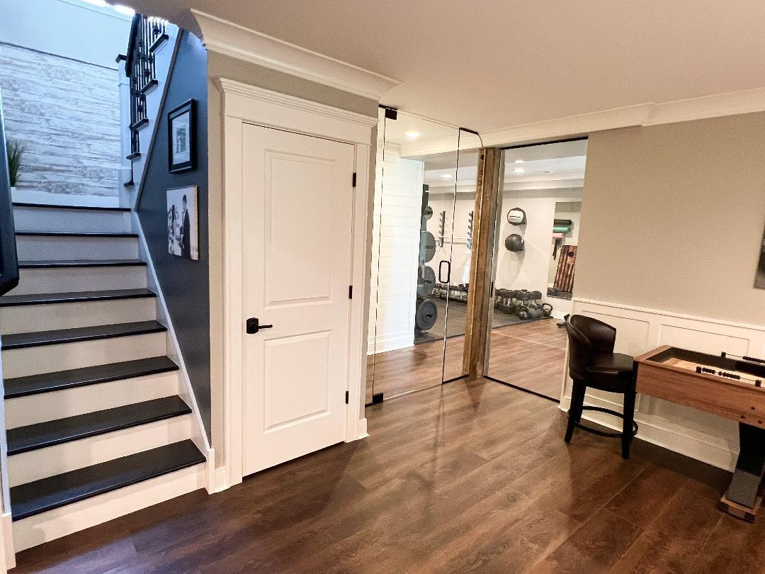 3503 Deep Cut Road Woodstock, IL 60098 - Photo 21 of 34 a view of an entryway with wooden floor and door