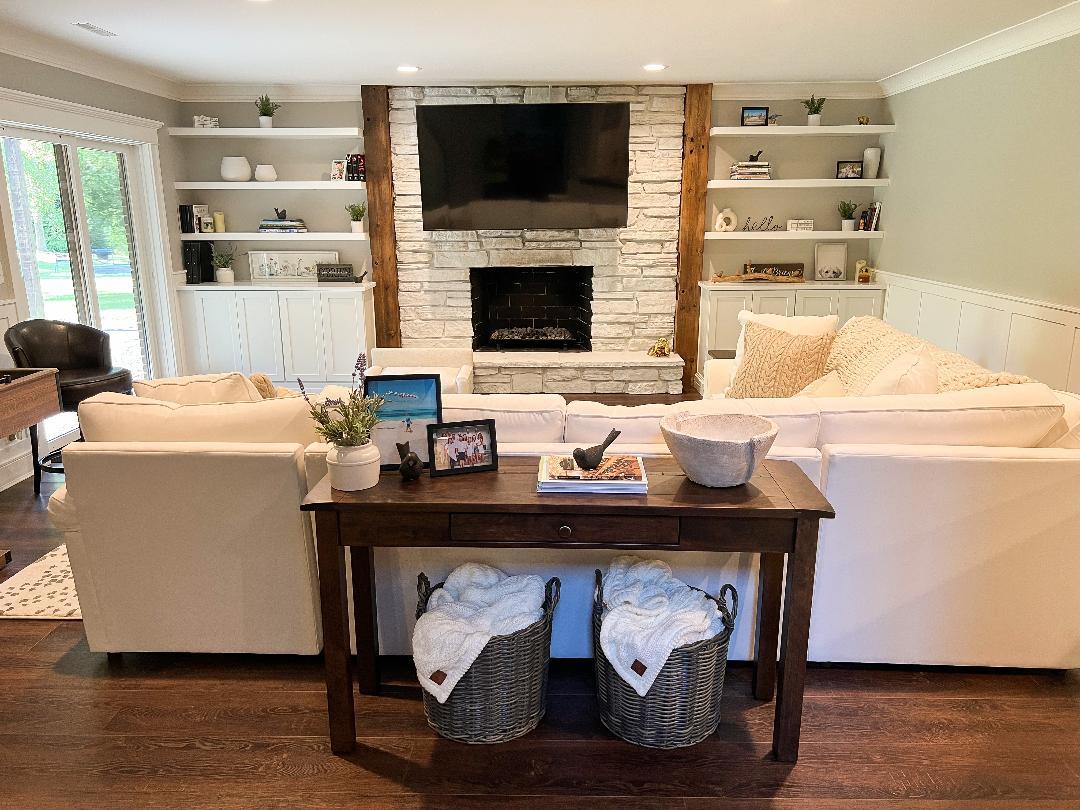 3503 Deep Cut Road Woodstock, IL 60098 - Photo 22 of 34 a living room with furniture and a fireplace