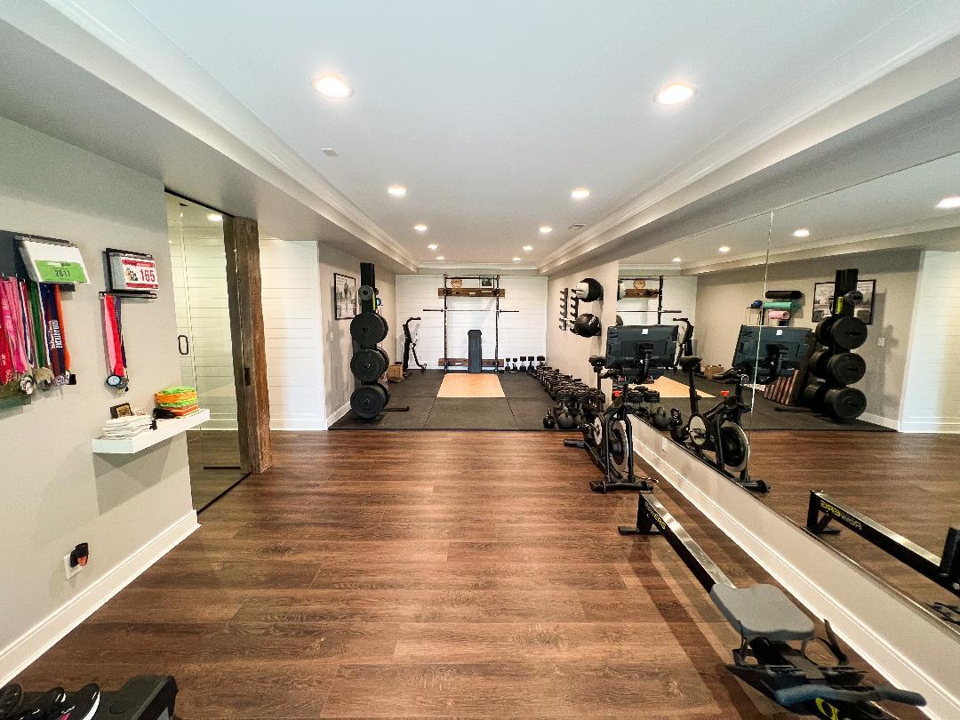 3503 Deep Cut Road Woodstock, IL 60098 - Photo 27 of 34 a view of a room with gym equipment and a large window