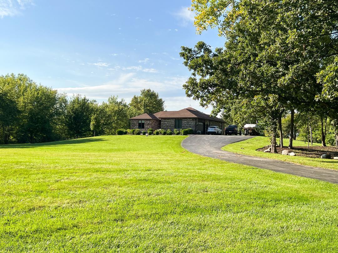 3503 Deep Cut Road Woodstock, IL 60098 - Photo 4 of 34 a view of a swimming pool with an outdoor space and seating area