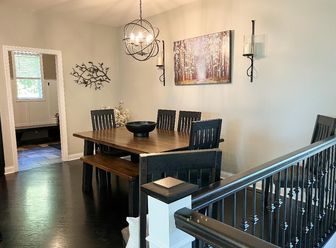 3503 Deep Cut Road Woodstock, IL 60098 - Photo 10 of 34 a view of a dining room with furniture wooden floor and chandelier