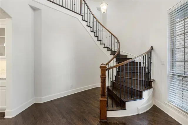 a view of entryway with wooden floor