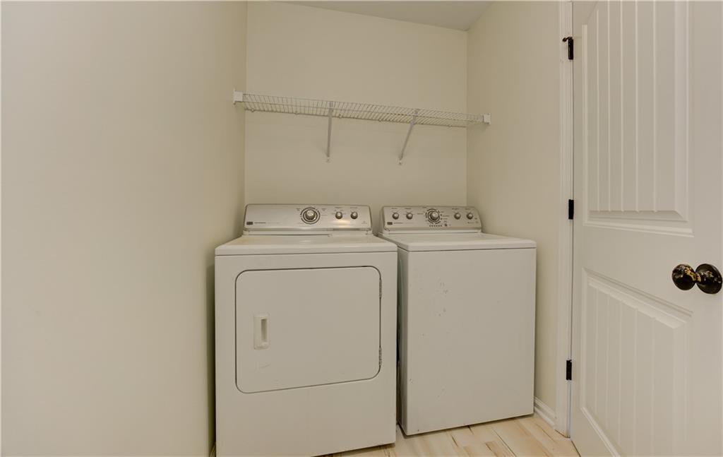 605 Summit Point Canton, GA 30114 - Photo 49 of 56 a utility room with dryer and washer