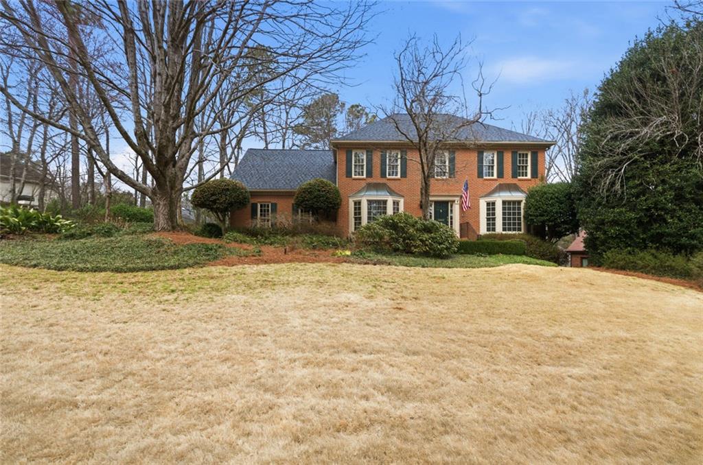 3463 Buck Hill Road Marietta, GA 30067 - Photo 1 of 82 a front view of a house with a yard