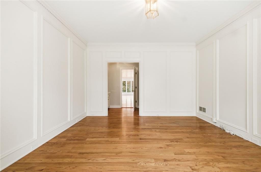 3463 Buck Hill Road Marietta, GA 30067 - Photo 14 of 82 a view of an empty room with wooden floor