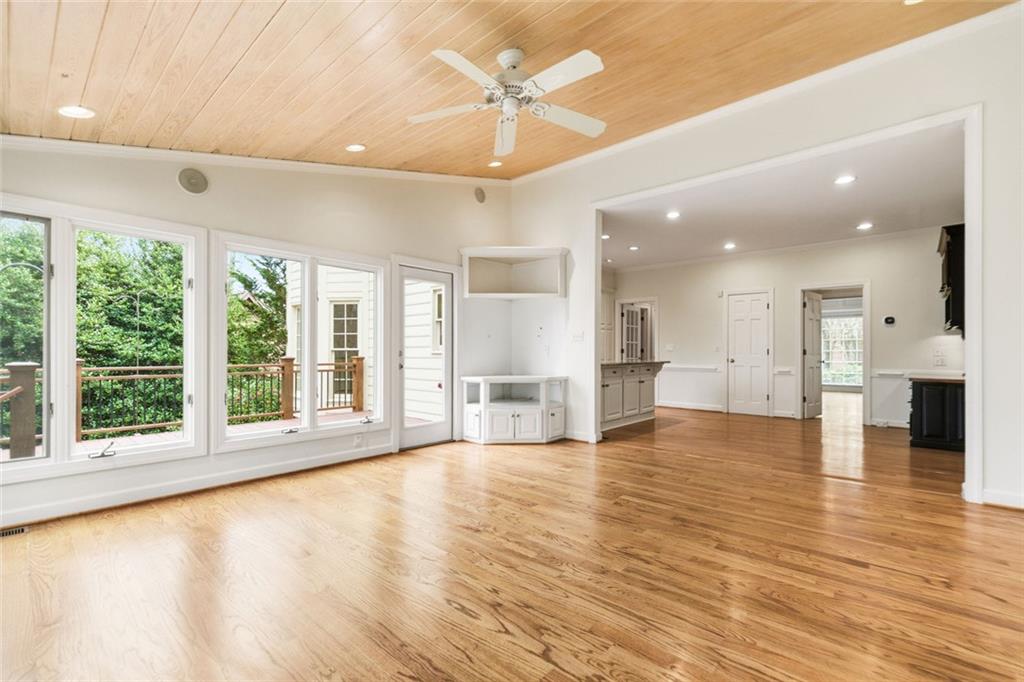 3463 Buck Hill Road Marietta, GA 30067 - Photo 32 of 82 a view of an empty room with wooden floor and a window