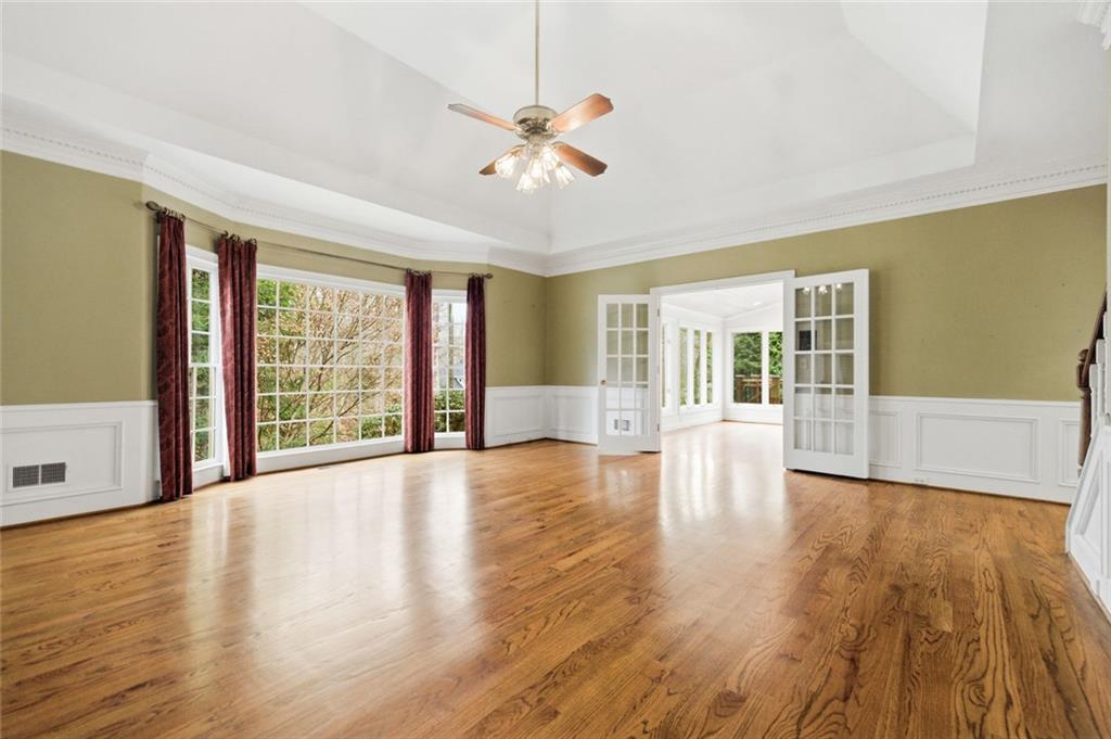 3463 Buck Hill Road Marietta, GA 30067 - Photo 36 of 82 a view of an empty room with wooden floor and a window