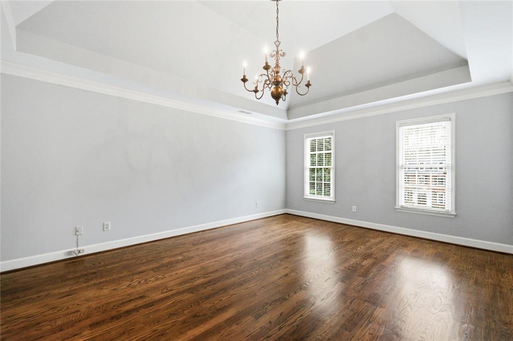 3463 Buck Hill Road Marietta, GA 30067 - Photo 41 of 82 a view of an empty room with wooden floor and a window