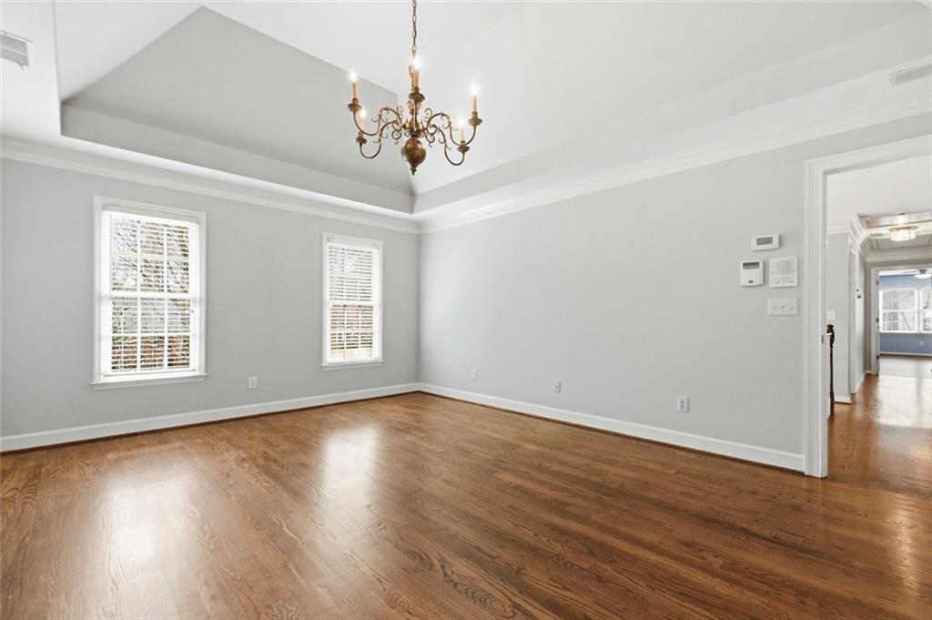 3463 Buck Hill Road Marietta, GA 30067 - Photo 54 of 82 a view of an empty room with wooden floor and a window