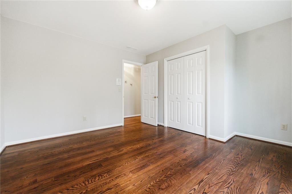 3463 Buck Hill Road Marietta, GA 30067 - Photo 56 of 82 a view of an empty room with wooden floor