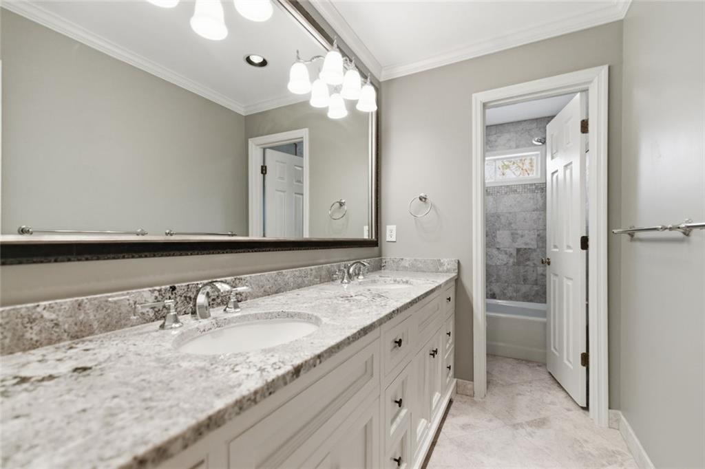 3463 Buck Hill Road Marietta, GA 30067 - Photo 58 of 82 a bathroom with a granite countertop sink mirror and double
