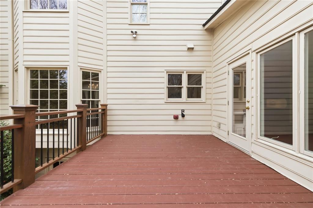 3463 Buck Hill Road Marietta, GA 30067 - Photo 70 of 82 a view of a porch with wooden floor and fence