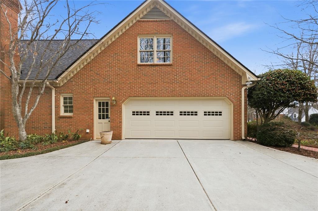 3463 Buck Hill Road Marietta, GA 30067 - Photo 7 of 82 a front view of a house with a yard