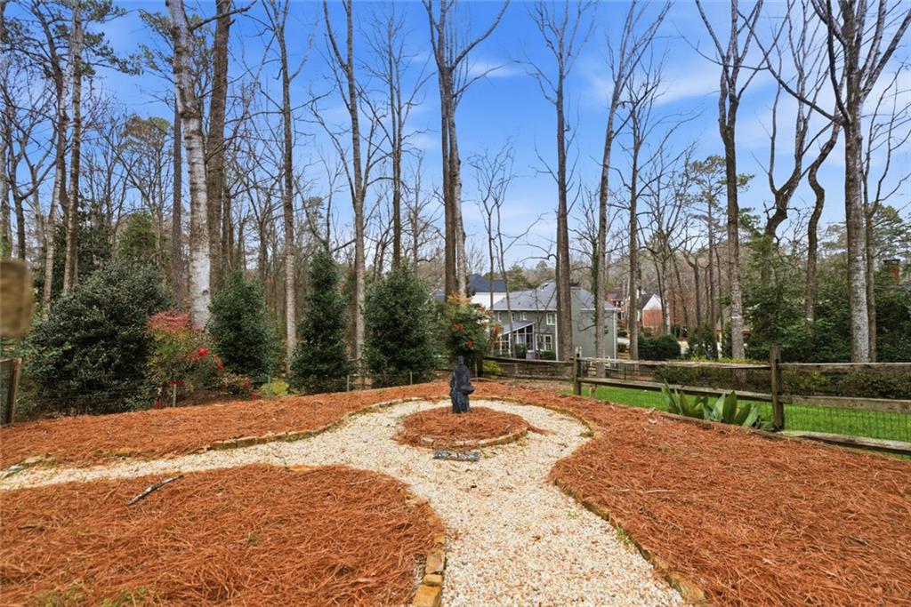3463 Buck Hill Road Marietta, GA 30067 - Photo 75 of 82 a swimming pool with an outdoor space and seating