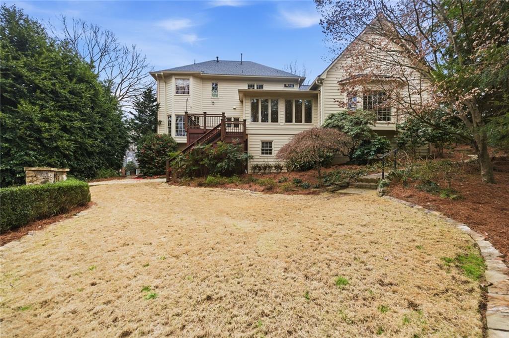 3463 Buck Hill Road Marietta, GA 30067 - Photo 78 of 82 a front view of a house with a yard