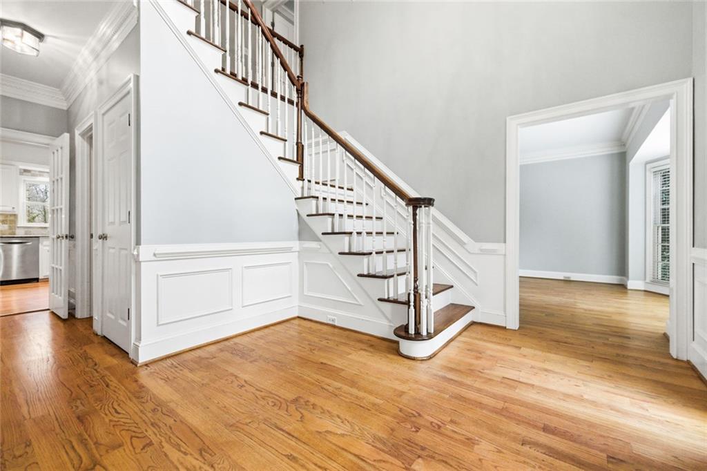 3463 Buck Hill Road Marietta, GA 30067 - Photo 9 of 82 a view of entryway with wooden floor and stairs