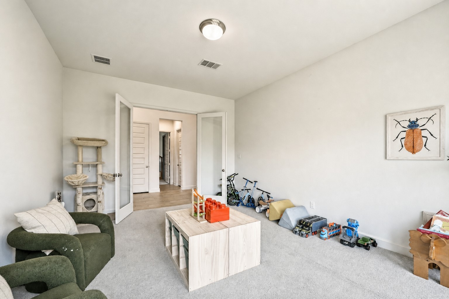 17801 Parnassum Path Conroe, TX 77302 - Photo 18 of 41 Large game room with double glass doors.