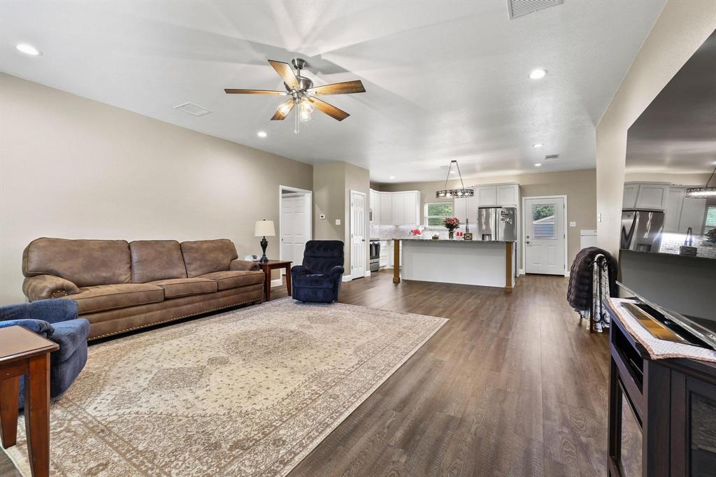 2658 Oak Ridge Road Denison, TX 75021 - Photo 8 of 37 a living room with furniture and kitchen view