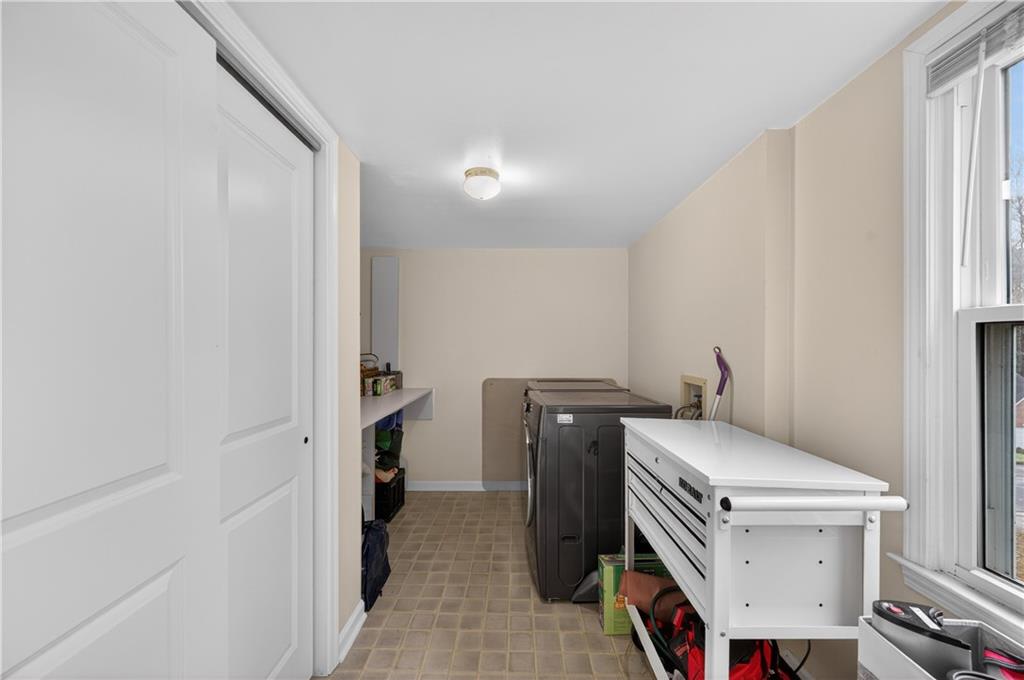 2878 Cardinal Trace Duluth, GA 30096 - Photo 16 of 42 a utility room with dryer and washer