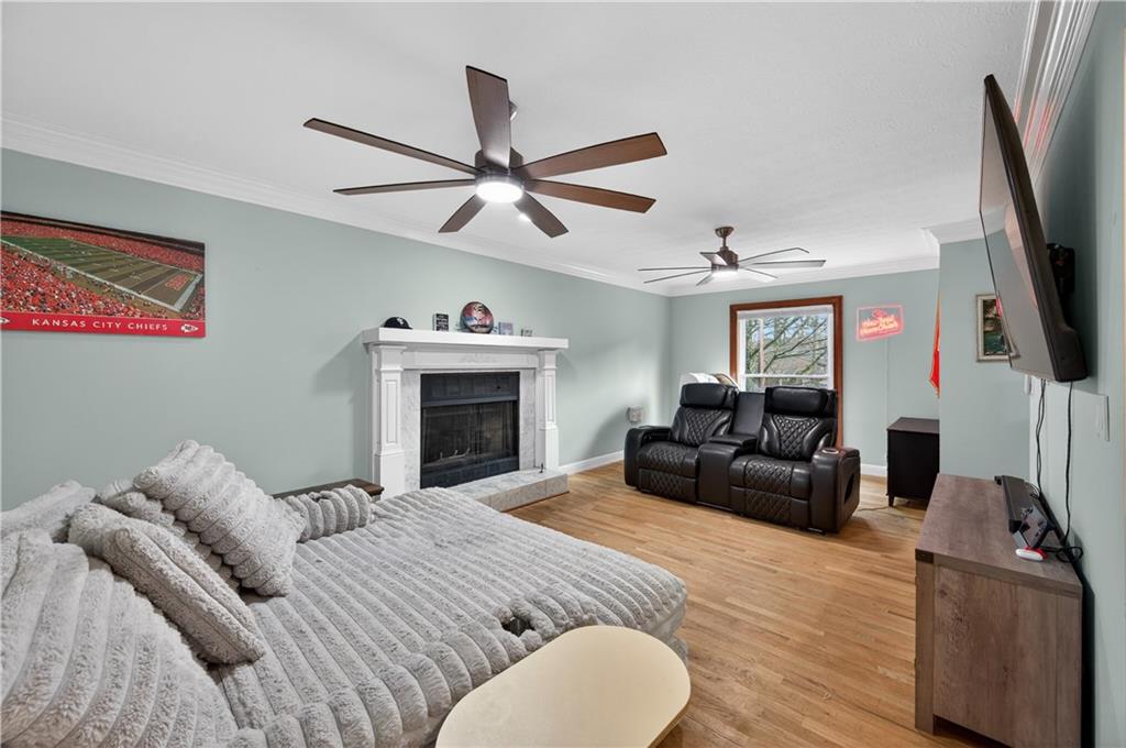 2878 Cardinal Trace Duluth, GA 30096 - Photo 5 of 42 a bedroom with a bed and a flat screen tv
