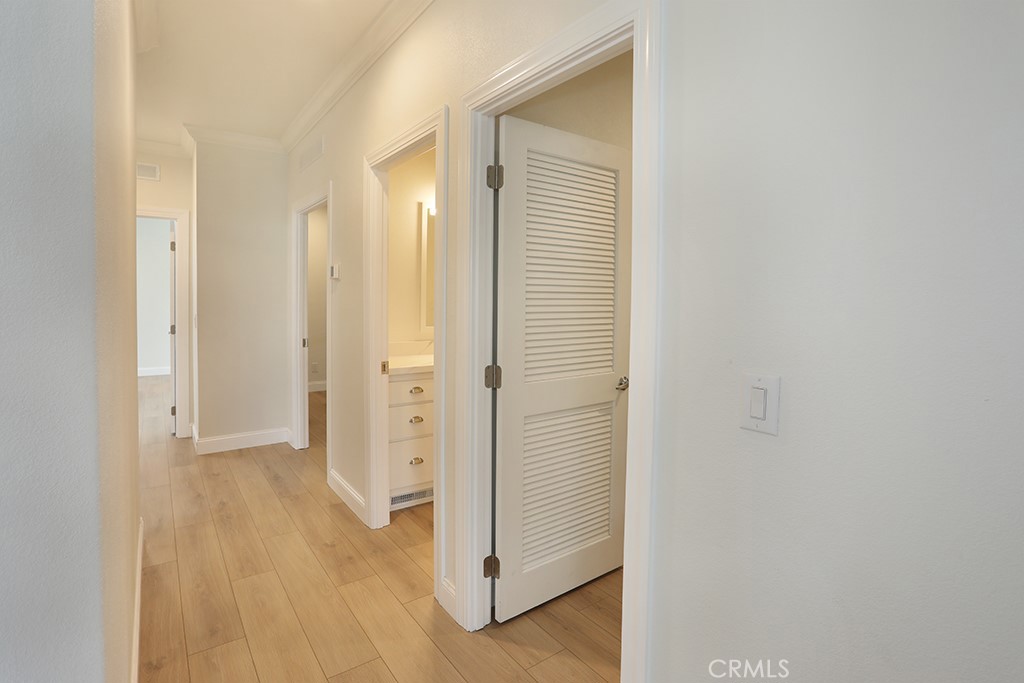 129 La Ronda Tustin, CA 92780 - Photo 16 of 33 a view of a bathroom with wooden floor