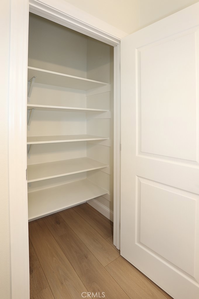 129 La Ronda Tustin, CA 92780 - Photo 24 of 33 a view of walk in closet with empty racks