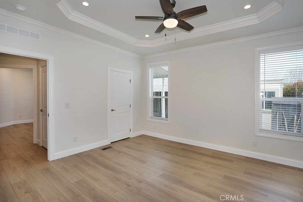 129 La Ronda Tustin, CA 92780 - Photo 26 of 33 wooden floor in an empty room with a window