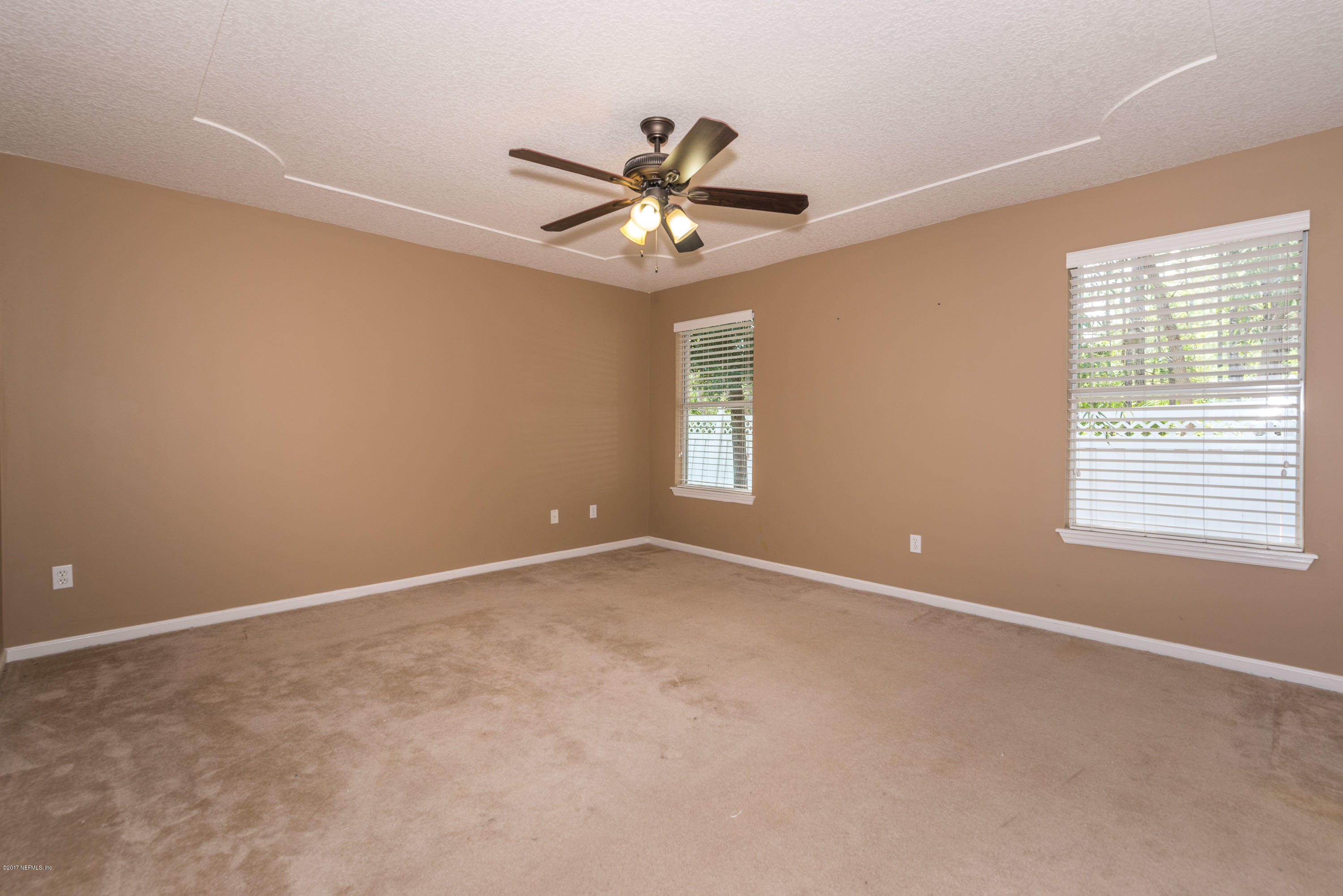 1797 Keswick Road St. Augustine, FL 32084 - Photo 12 of 31 a view of an empty room with a window