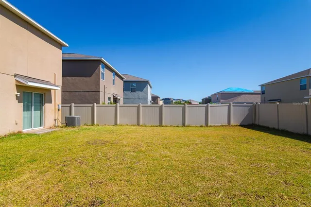 a view of an empty room with basketball court