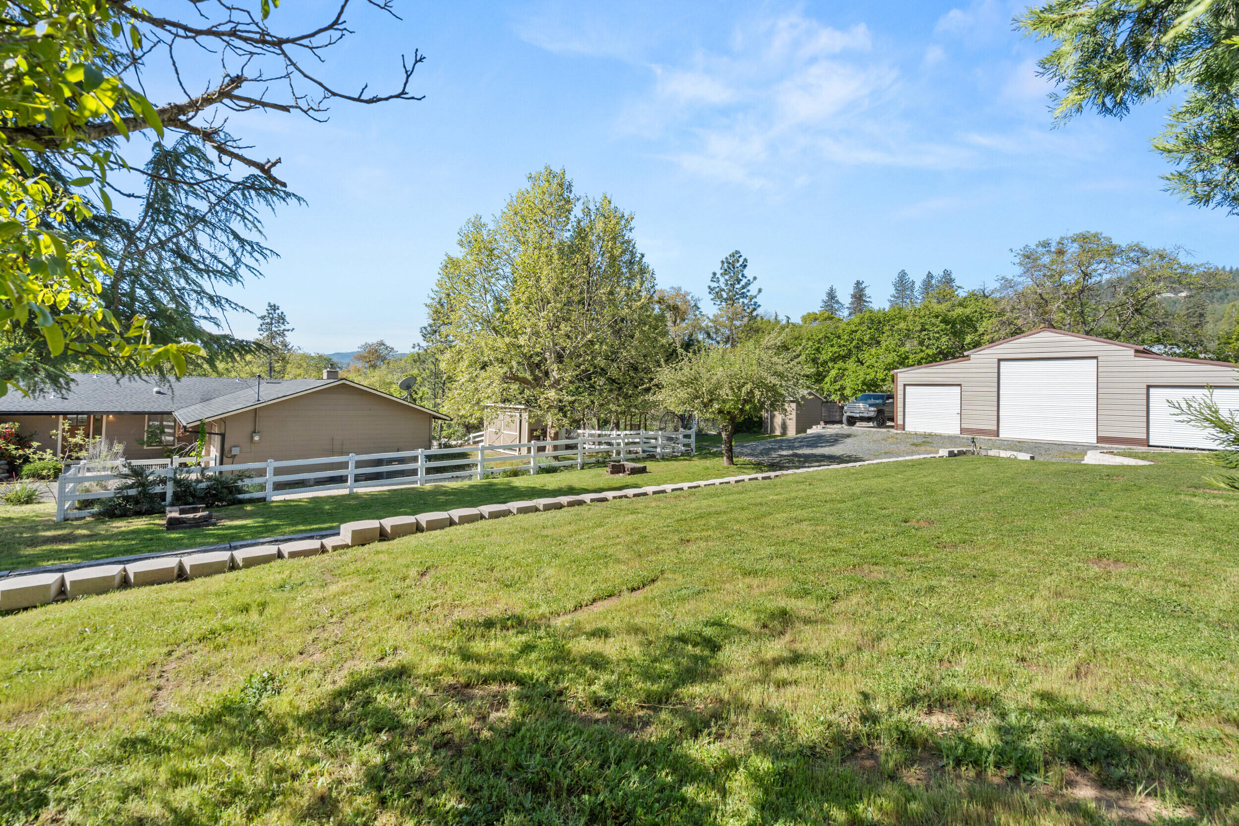 3583 Ross Lane Central Point, OR 97502 - Photo 48 of 52 a house view with swimming pool in front of it