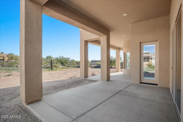 a view of a road with an ocean view