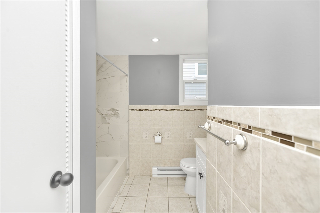 11 Greendale Road, Unit 2 Boston, MA 02126 - Photo 24 of 25 a view of a bathroom with a toilet