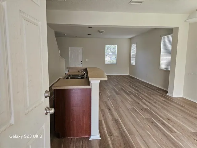 a bathroom with a glass door shower