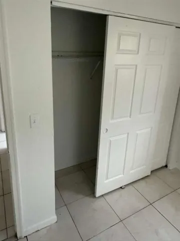 a bathroom with a toilet and a bathtub