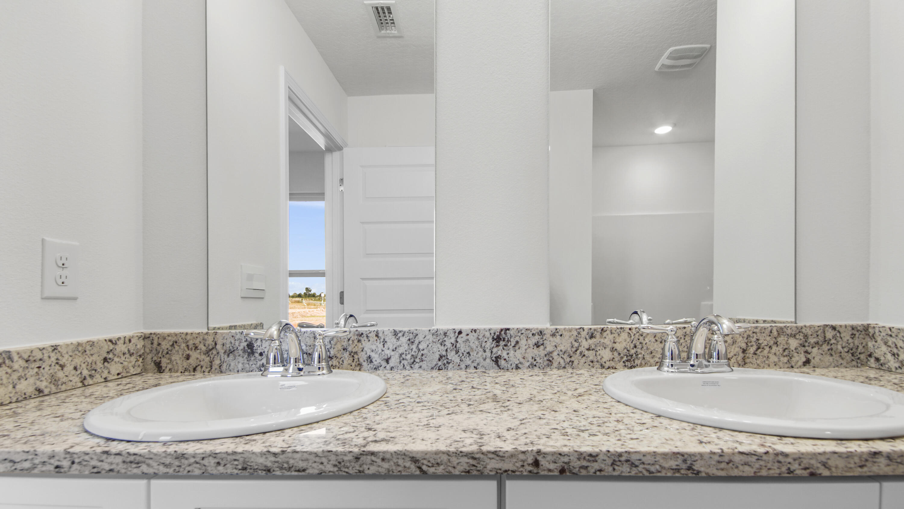234 Gray Owl Drive Freeport, FL 32439 - Photo 21 of 37 a bathroom with a granite countertop sink and a mirror