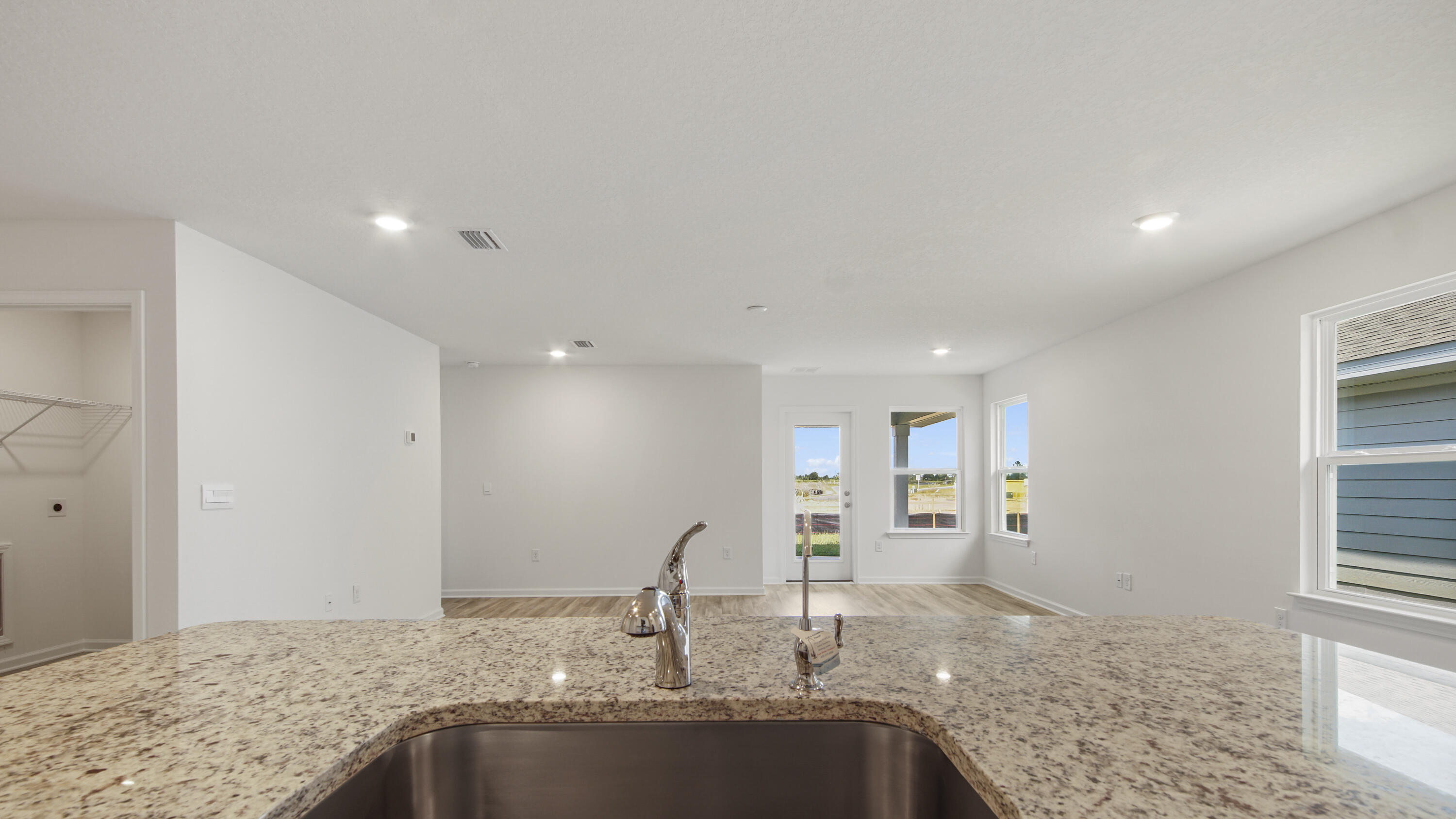 234 Gray Owl Drive Freeport, FL 32439 - Photo 8 of 37 a bathroom with a granite countertop sink and mirror