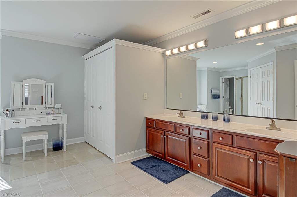 7098 Falcon Way Trinity, NC 27370 - Photo 25 of 45 primary bathroom with laundry