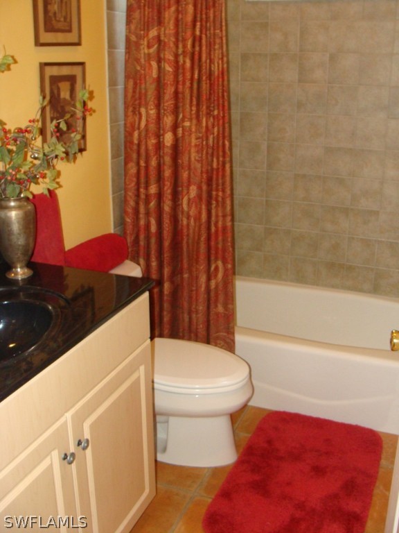 13710 Robert Road Bokeelia, FL 33922 - Photo 14 of 24 a bathroom with a toilet and a shower