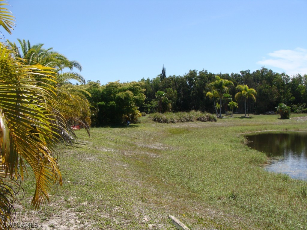 13710 Robert Road Bokeelia, FL 33922 - Photo 21 of 24 a view of a lake view